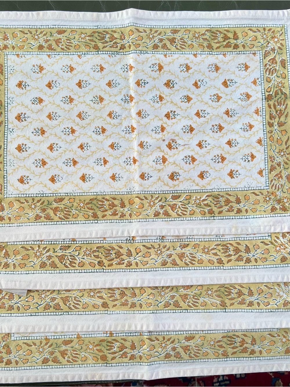 Four (4) Pomegranate cotton block print placemats.  In good used condition.